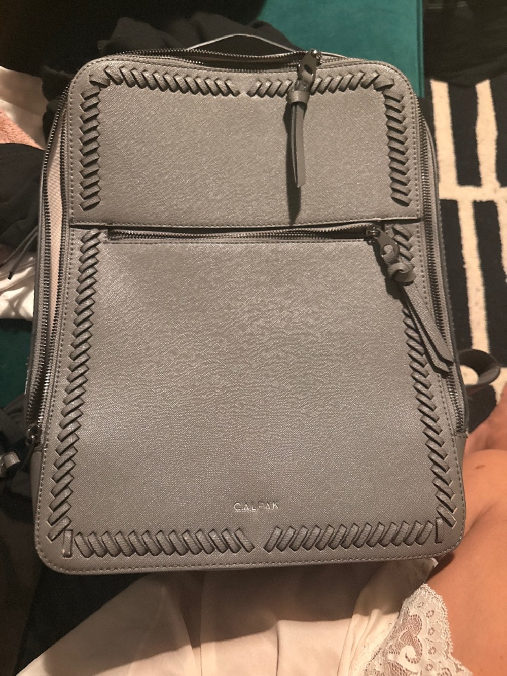 Gray faux leather laptop backpack